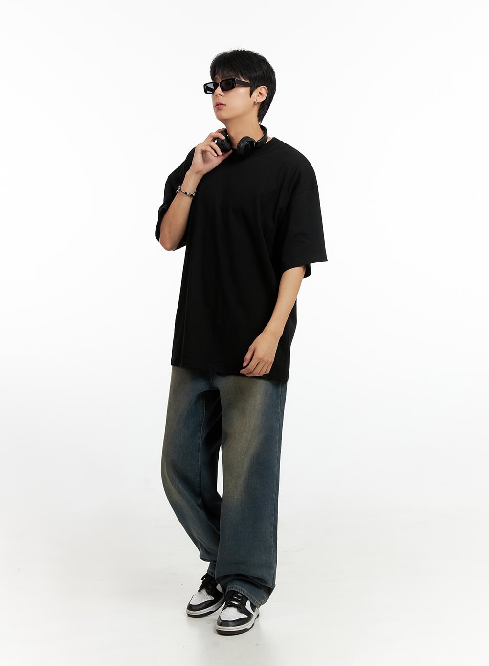 LEWKIN Men's Vintage Washed Loose Fit Jeans (Dark Blue) IG402, full-length front-angle on model with sunglasses, wide-leg silhouette with faded wash, paired with black oversized tee and sneakers.