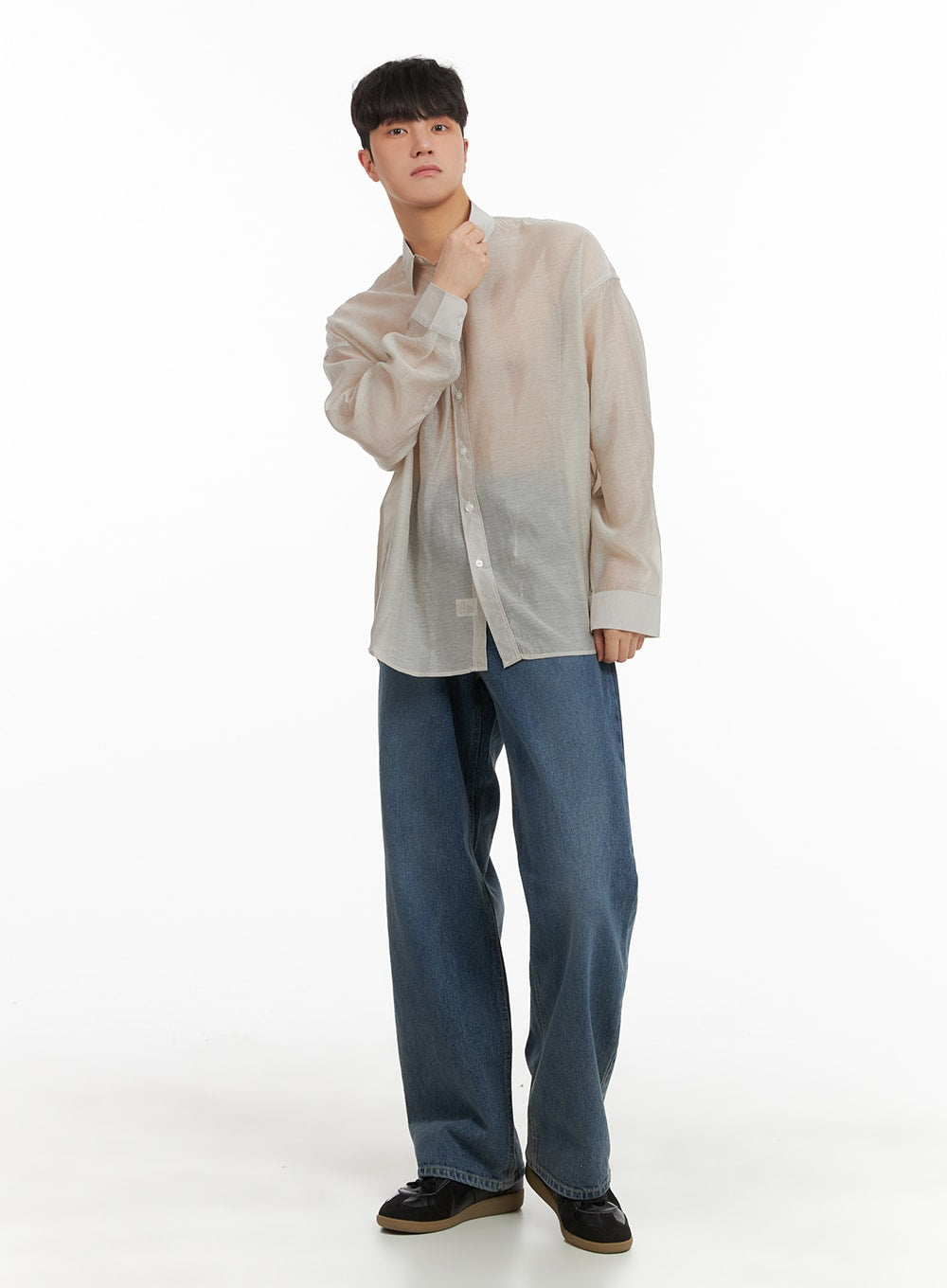 LEWKIN Men's Washed Denim Wide Fit Jeans IA402 in blue, 3/4 front view on model, relaxed wide leg with washed finish, paired with beige sheer shirt and black loafers.