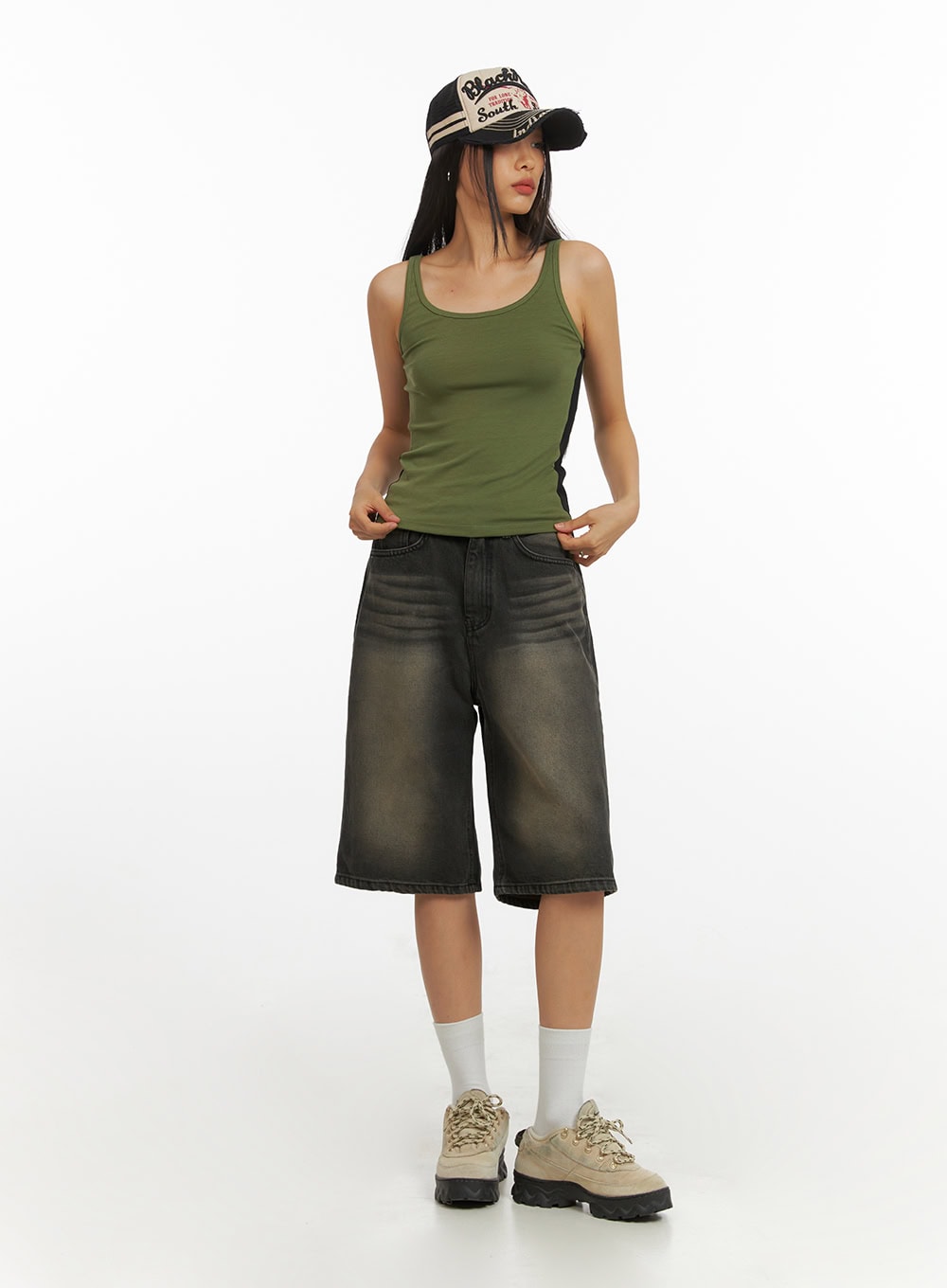 LEWKIN Color Washed Jorts IY422 in black washed denim, full-length front view on model with slight pose, wide-leg cotton jorts paired with green tank and trucker cap.