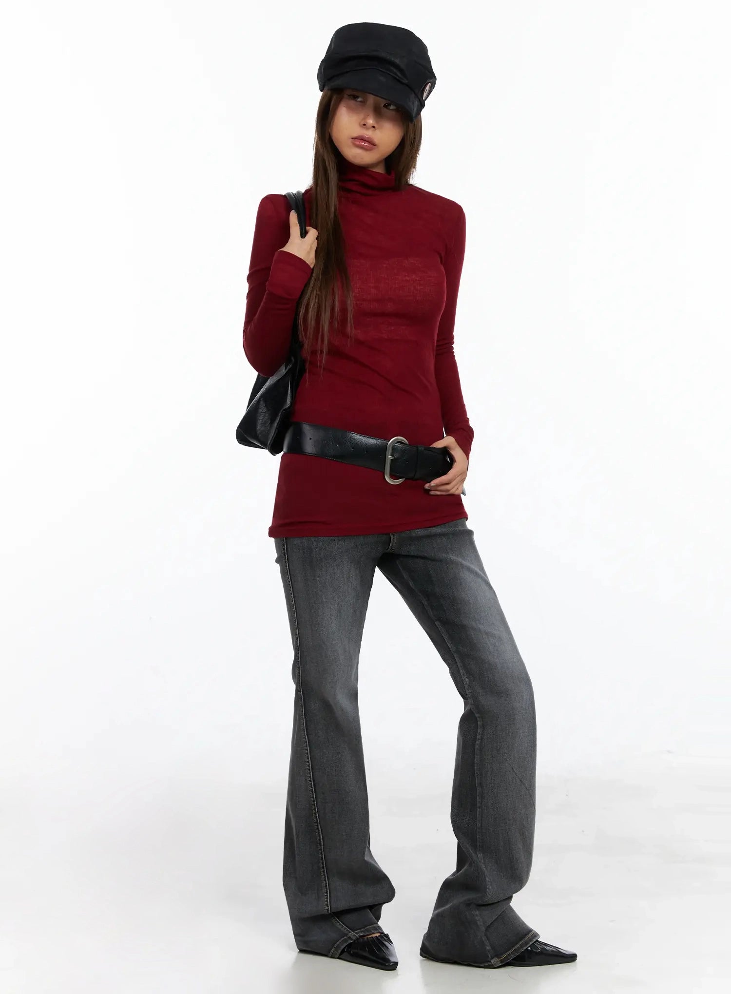 LEWKIN Phoe Flared Jeans ID503 in washed grey, full-length front view on model styled with burgundy turtleneck, black belt, newsboy cap, and black mule heels.