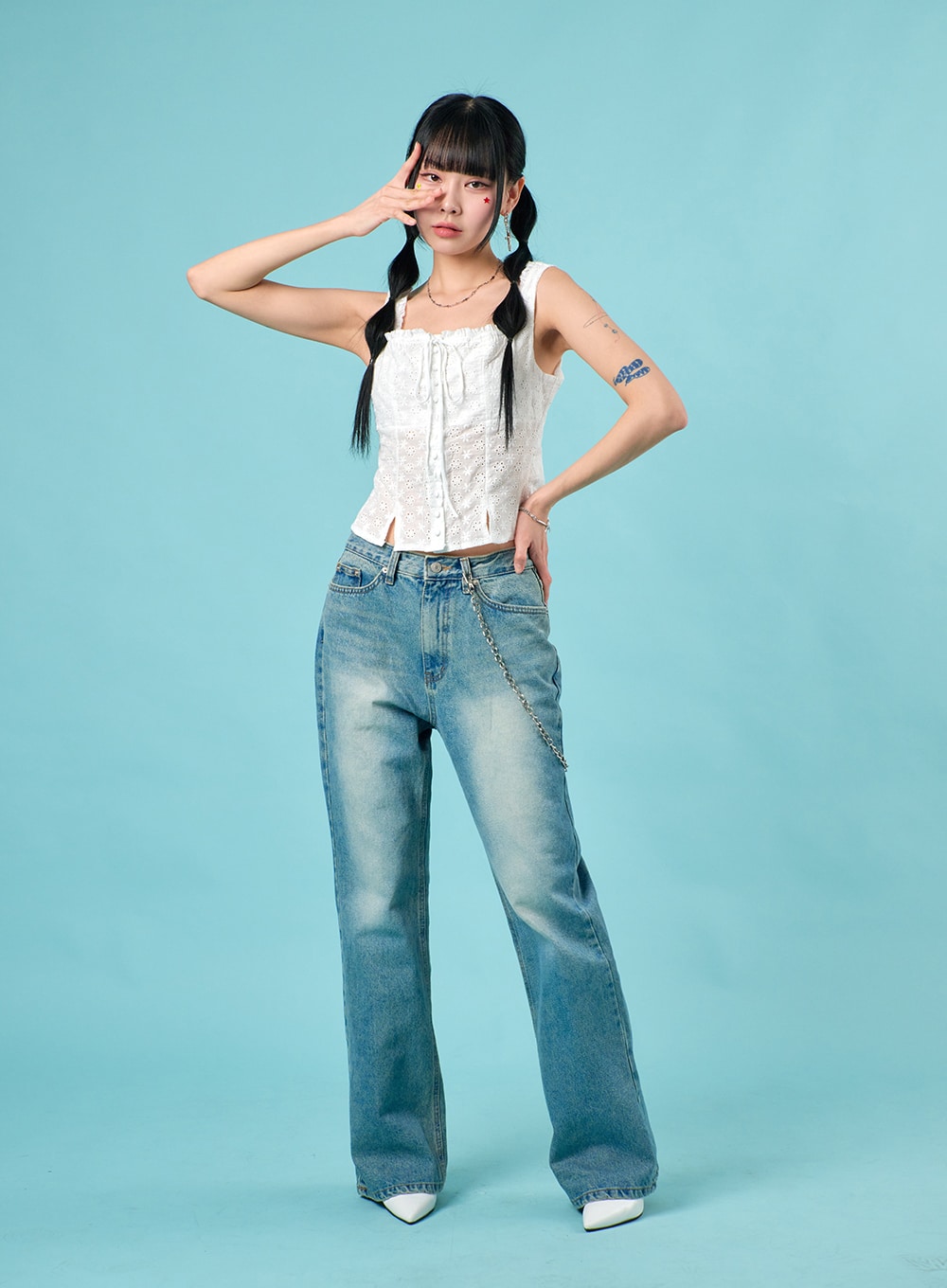 LEWKIN Washed Straight Leg Bootcuts Jeans IJ430 in light blue, full-length front view on model, washed cotton denim with subtle fading and chain detail, styled with white lace corset top and white mules.