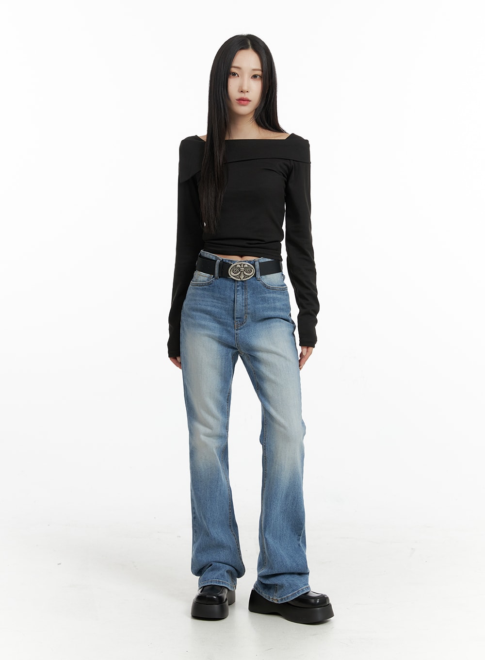 LEWKIN Washed Slim Fit Bootcut Jeans CF415 in light blue, full-length front view on model, high-waist slim fit with subtle bootcut flare, styled with black off-shoulder top and statement belt.