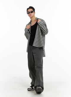 LEWKIN Men's Classic Baggy Fit Jeans IA401 in washed grey, full-length front shot on model, wide-leg silhouette, paired with plaid overshirt and black tank, sneakers.