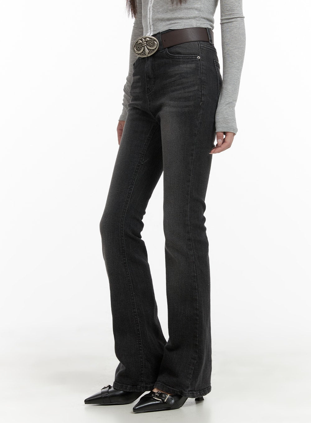 LEWKIN Slim Washed Denim Bootcut Jeans CA403 in black, side view on model, slim fit washed denim with gentle bootcut flare, styled with gray top and brown western belt.