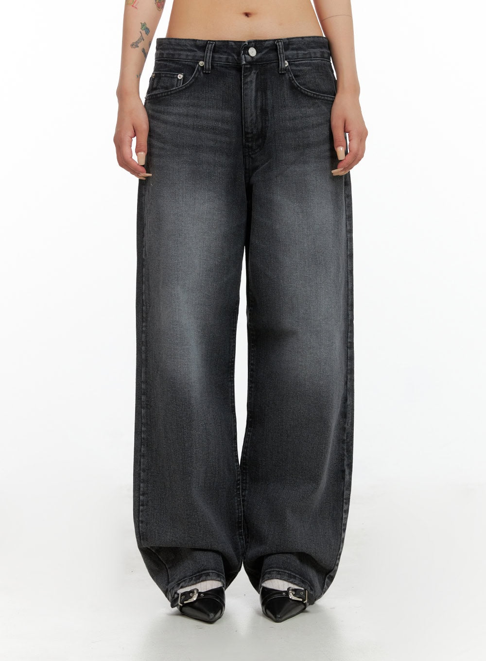 LEWKIN Low Rise Wide Leg Jeans CL415 in black, front crop view on model, washed denim wide fit with low waist, five-pocket styling, paired with buckle mules.