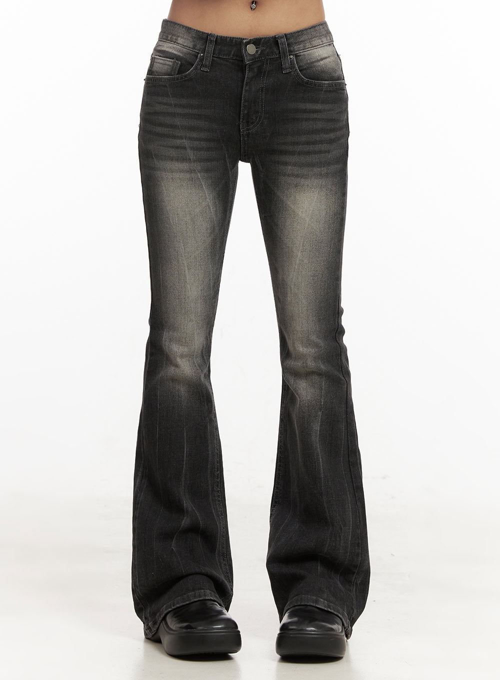 LEWKIN Georgina Low-Rise Flared Jeans CJ507 in black, front crop view on model, washed denim with faded grey highlights, slim fit through thigh flaring to bootcut hem, paired with black platform loafers.