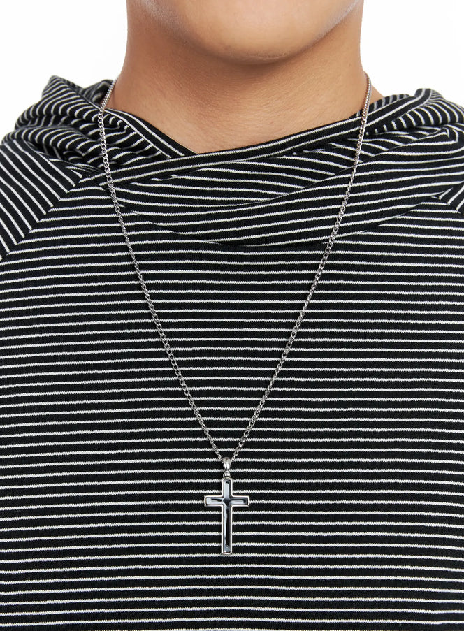 LEWKIN Men's Cross Pendant Necklace IS502 in Black, close-up on model's chest, silver chain with black cross pendant, worn over striped hoodie.