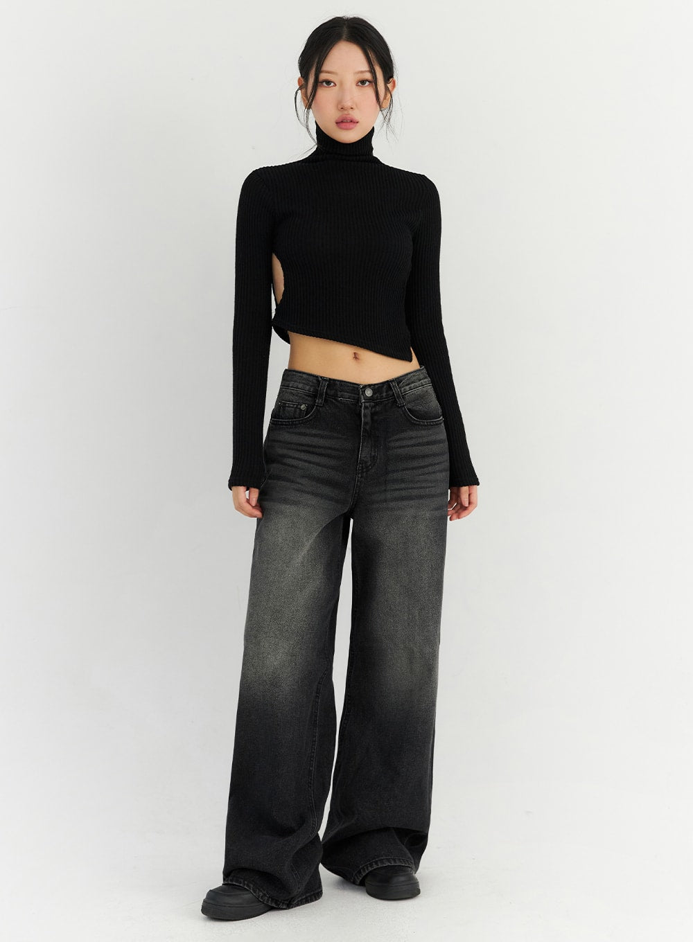 LEWKIN Back Slit Washed Wide Leg Jeans CN306 in Black, full front view on model, low-waist washed denim, ultra-wide leg, tall length, styled with black ribbed turtleneck crop top and chunky sneakers.