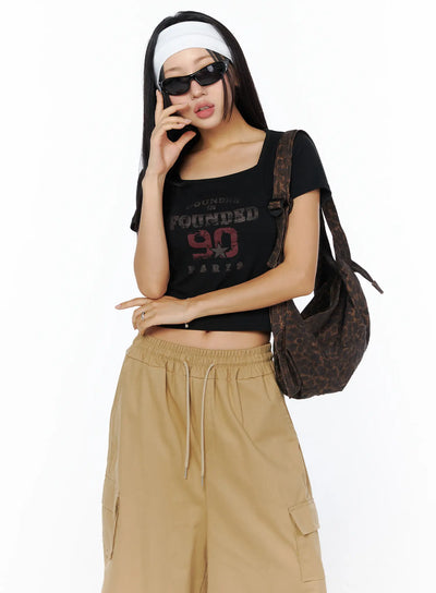 casual-graphic-crop-top-cu515 / Black
