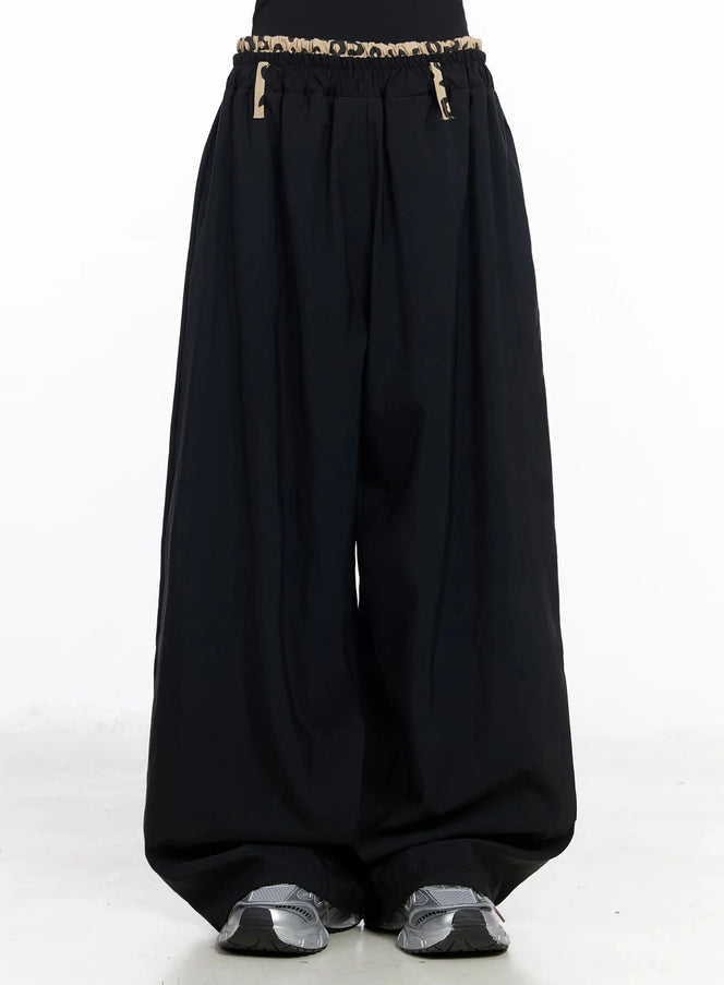 graphic-trim-wide-leg-pants-iy511 / Black