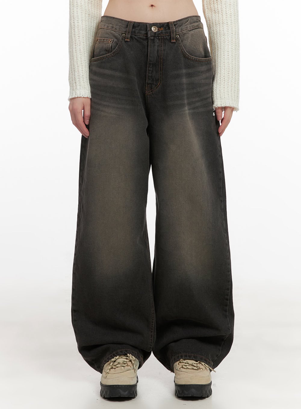 LEWKIN Celina Washed Baggy Wide-Leg Jeans CD426 in black, front waist-down shot on model, low-rise washed cotton denim with wide baggy leg, paired with cream knit crop top and chunky sneakers.