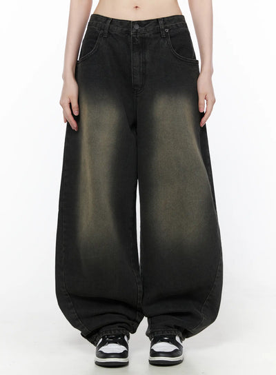 LEWKIN Bodie Vintage Wash Wide Leg Jeans CU519 in black, front full-length on model, vintage-washed denim with khaki fade, balloon wide leg silhouette, paired with sneakers.