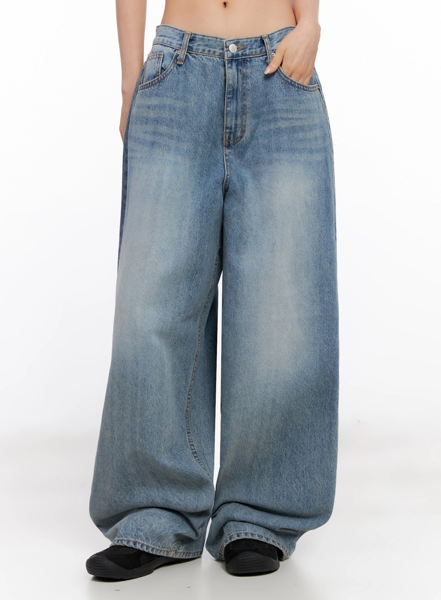 LEWKIN Seojin Washed Wide-Leg Jeans IG508 in blue, front cropped view on model, hand in pocket, ultra-wide cotton denim with washed fading and 5-pocket detail.