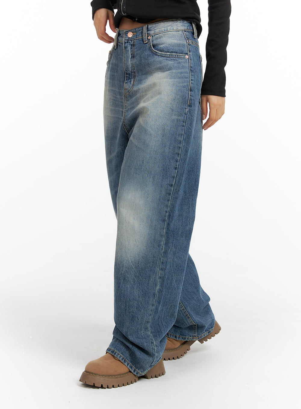 LEWKIN Wide Washed Denim Jeans CF419 in blue, side view on model, wide-leg cotton denim with vintage wash, paired with black top and tan lug-sole boots.