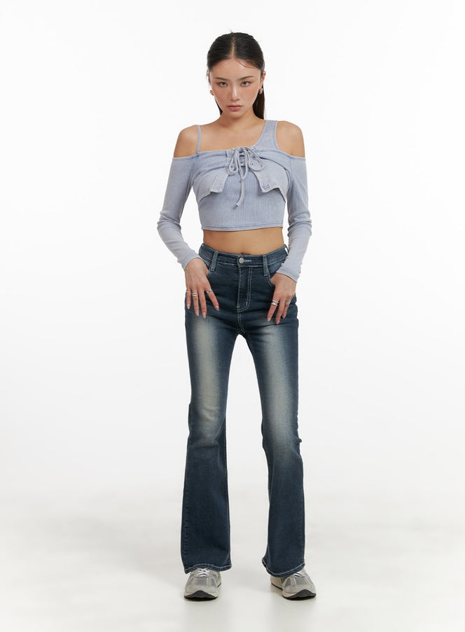 LEWKIN Washed Denim Slim Fit Bootcut Jeans CY402 in blue, full-length front on model, slim fit with bootcut flare, washed denim, paired with grey cold-shoulder crop top and sneakers.