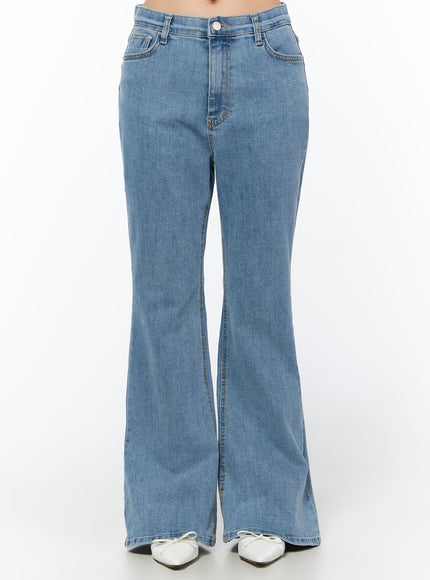 LEWKIN Leana Stretch Bootcut Jeans IU519 in blue, front crop view on model, normal-fit washed cotton-spandex denim, bootcut flare hem, 5-pocket, styled with white ballet flats.