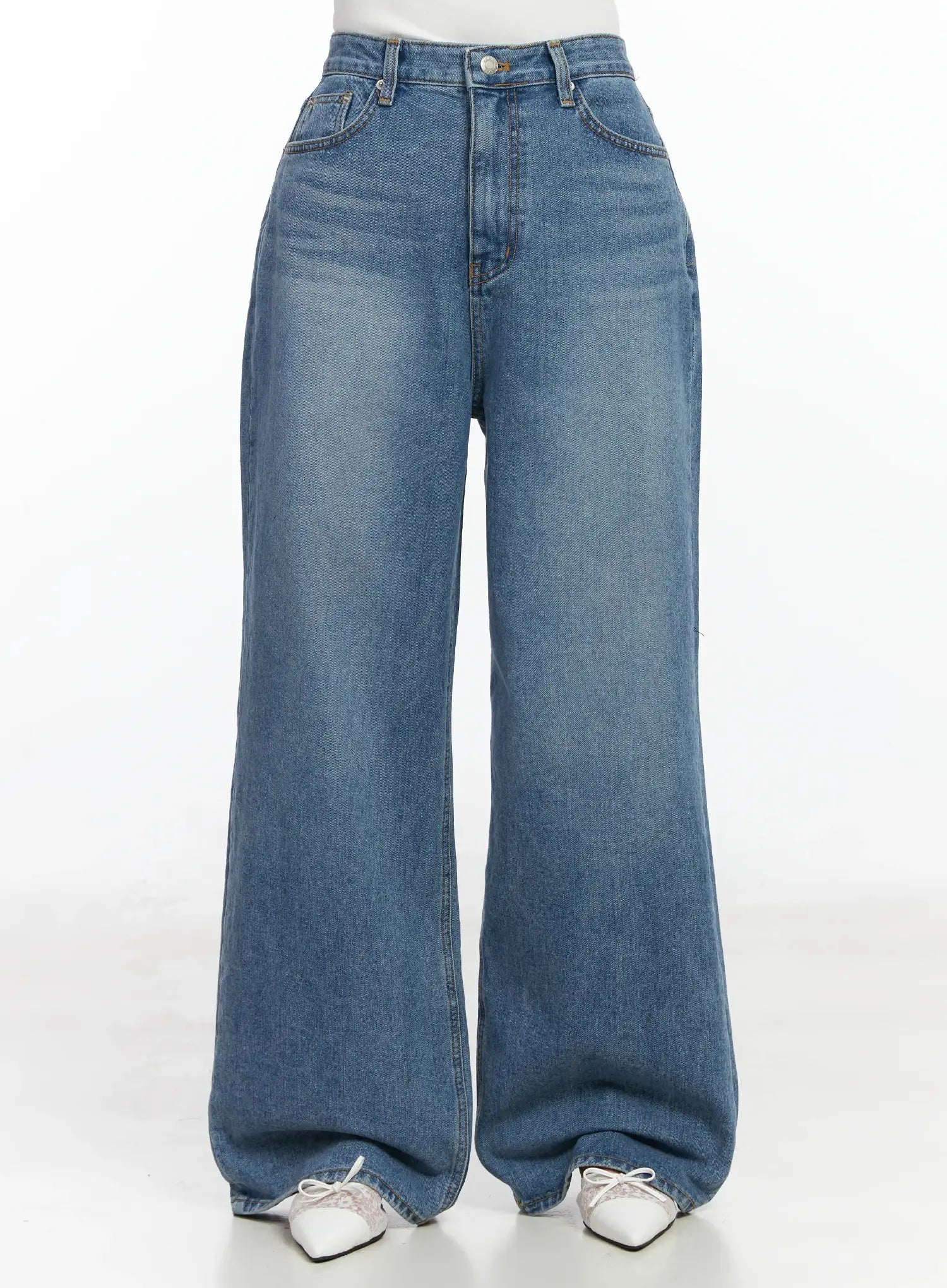 LEWKIN Ensley Wide Leg Jeans IJ529 in blue, front product shot on model, washed cotton wide-fit high-rise with five-pocket detail, full length, styled with white sneakers.