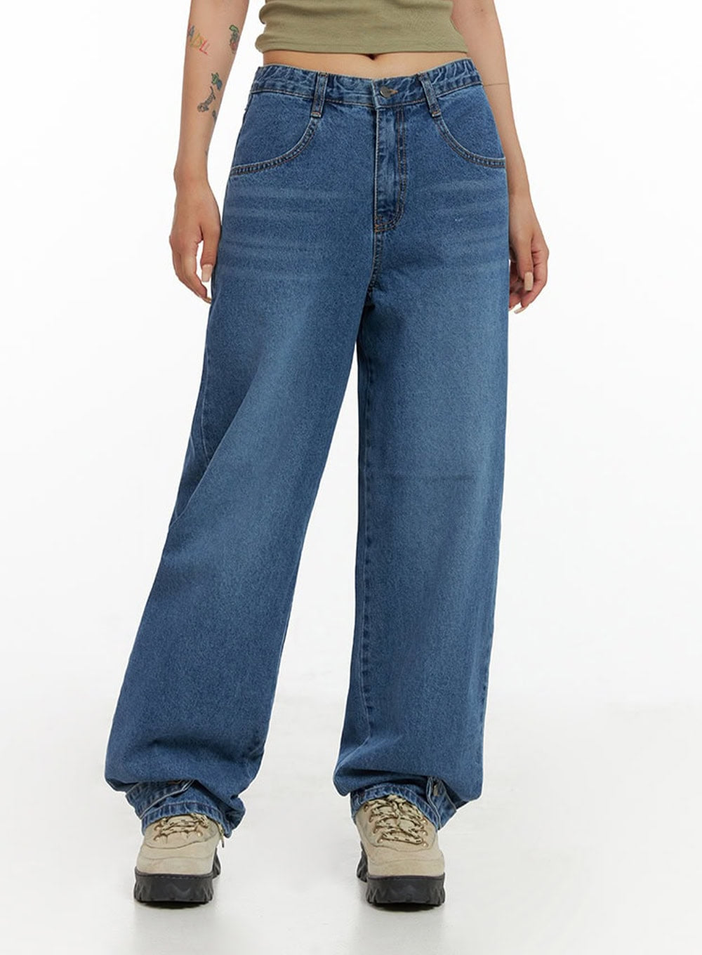LEWKIN Wide Leg Baggy Jeans CL415 in blue, front waist-down crop shot on model, washed cotton denim, wide baggy fit with button fly and front pockets, styled with chunky sneakers.