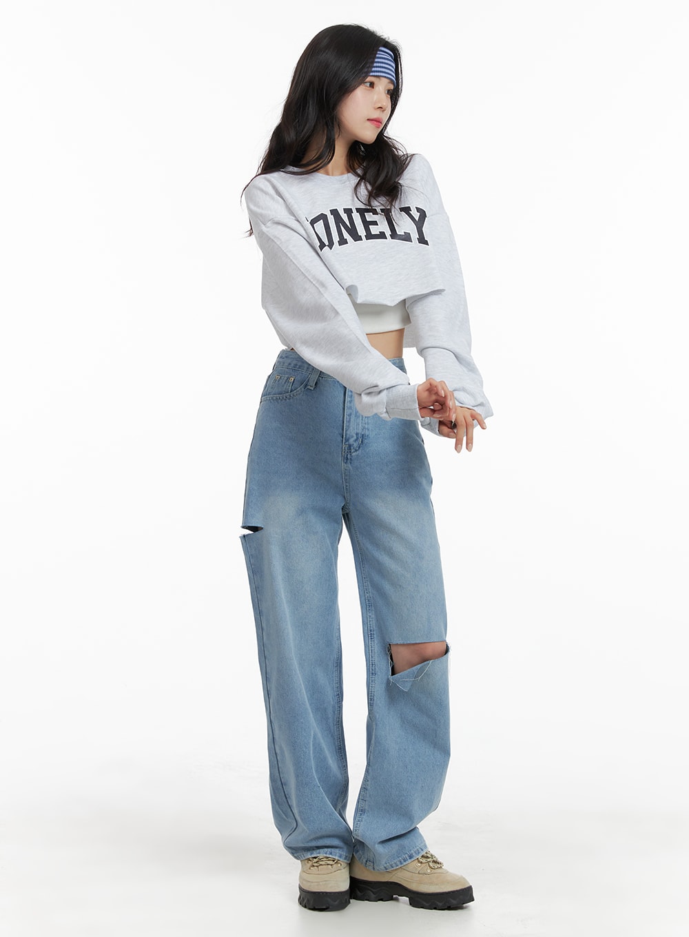 LEWKIN Cut Out Washed Straight Jeans OM421 in blue, full-body front-angle on model, washed cotton straight fit with thigh cut-out detail, styled with grey crop sweatshirt and chunky sneakers.