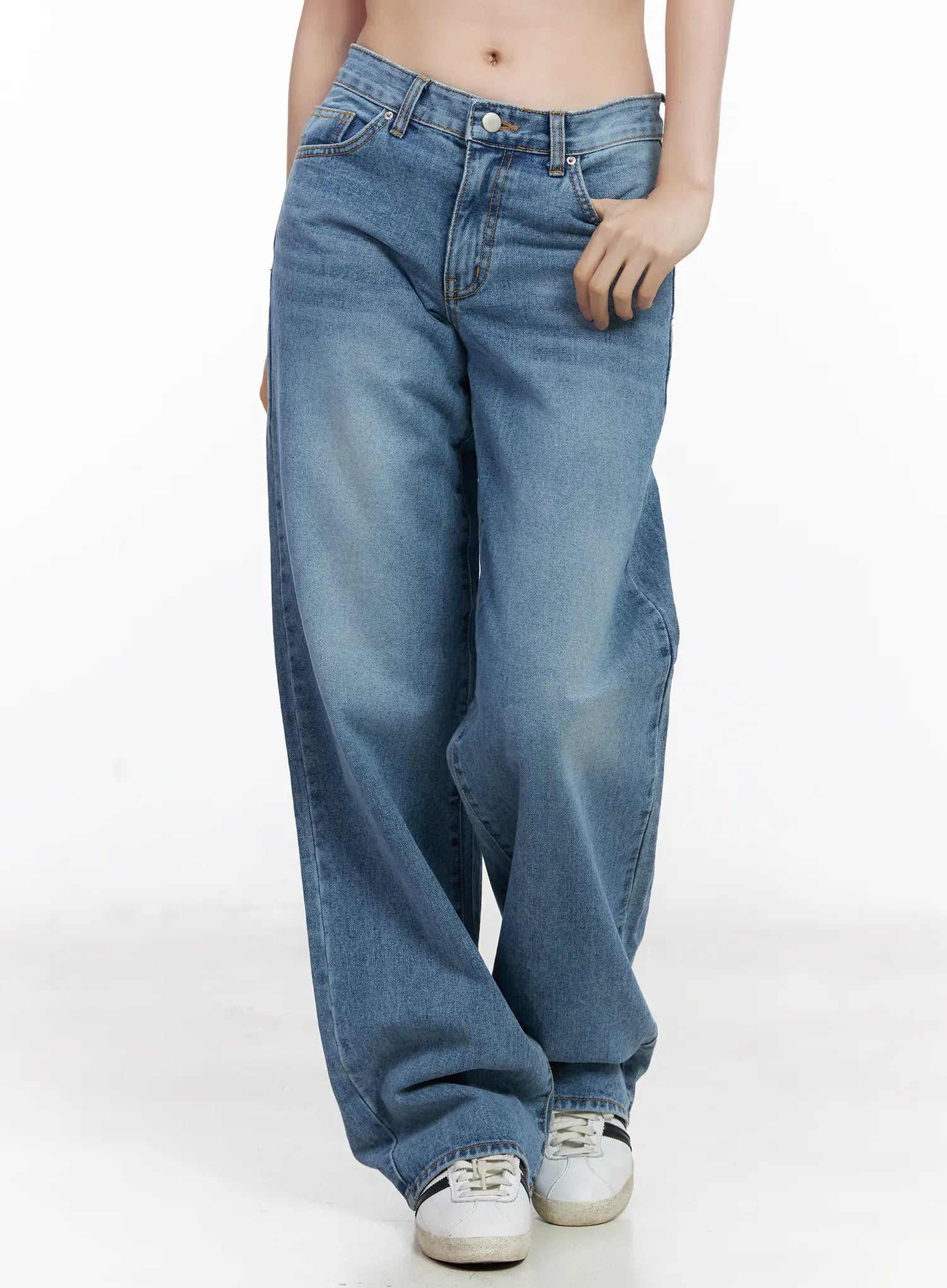 LEWKIN Maisy Casual Wide Leg Jeans CJ519 in blue, front crop view on model, washed cotton wide-fit long leg, low-rise waistband with button closure, paired with white sneakers.