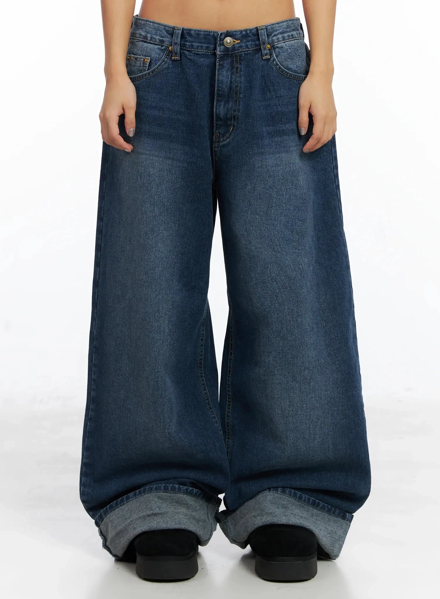 LEWKIN Anahi Baggy Jeans IN528 in blue, front product shot on model, wide-leg washed cotton denim with oversized roll-up cuff hem, worn alone showing full length.
