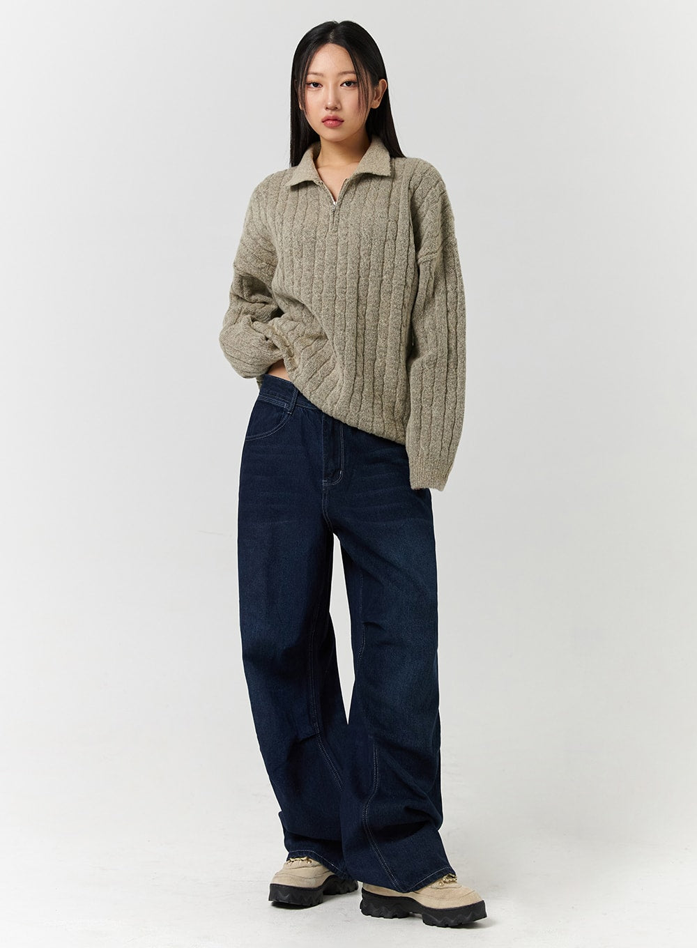 LEWKIN Unisex High Waist Solid Pocket Straight Leg Jeans CD328 in Blue, full-body front view on model, wide-leg cotton denim with high waist, paired with beige half-zip cable-knit sweater and chunky sneakers.