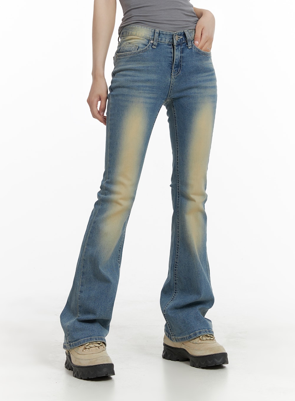 LEWKIN Slim Fit Washed Bootcut Jeans CA402 in blue, front cropped view on model, slim fit denim with vintage yellow wash fading, five-pocket styling, paired with chunky boots.