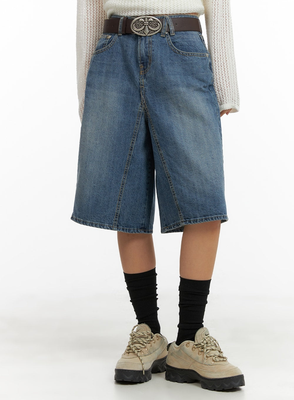 LEWKIN Vintage Washed Wide Leg Jorts CA415 in blue, front close-up on model, wide-fit cotton denim with vintage wash, ornate silver belt buckle, styled with white knit and chunky sneakers.