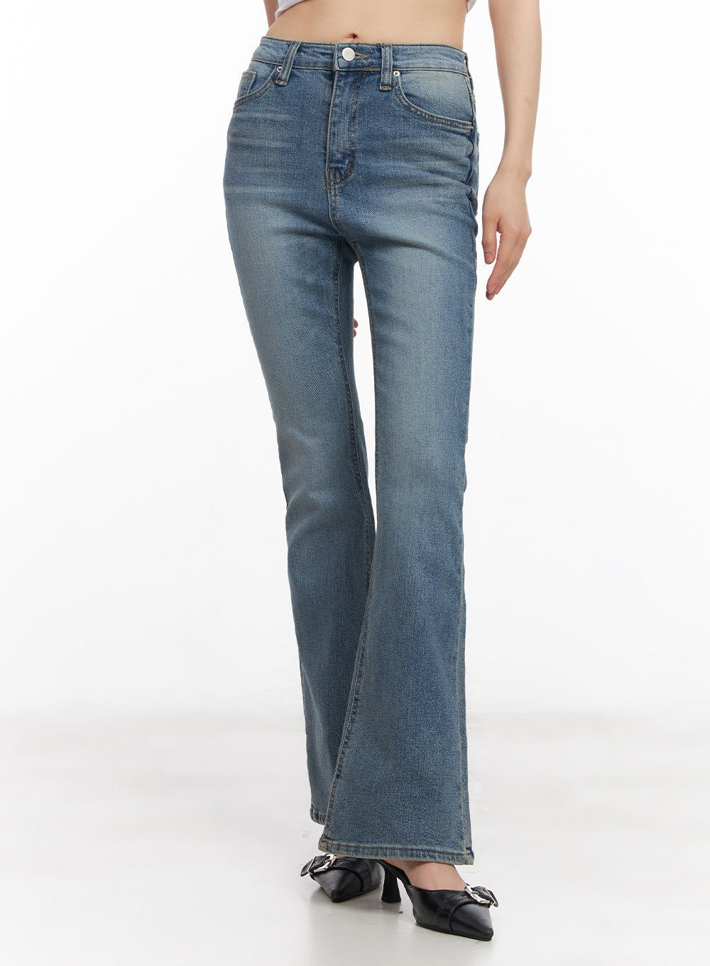 LEWKIN Cassy Slim Washed Flared Jeans CY512 in blue, front close-up on model, slim bootcut silhouette with washed denim finish, paired with black kitten-heel mules.