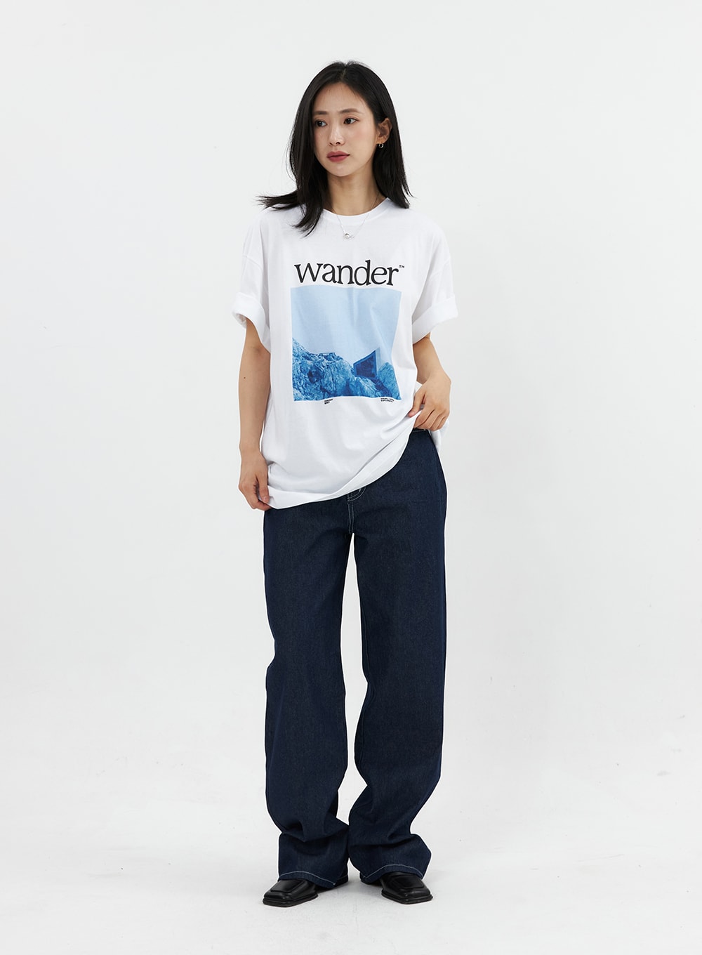 LEWKIN Stitched Jeans OO305 in Blue (2XL), front full-length on model, wide-fit dark indigo denim with contrast stitching, styled with white graphic tee and black loafers.