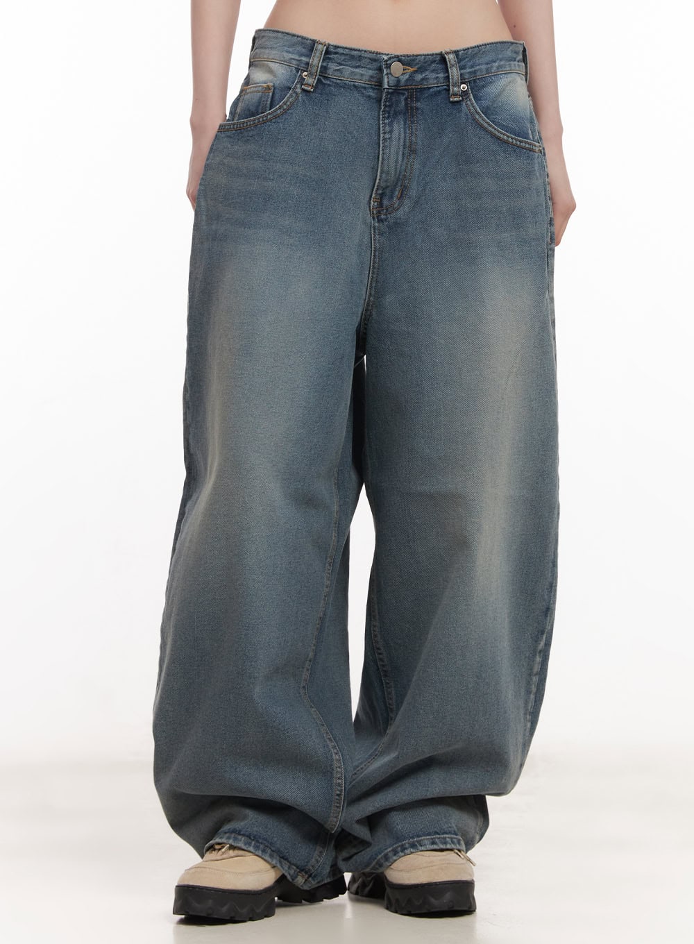 LEWKIN Shelly Washed Baggy Jeans CM518 in blue, front crop view on model, ultra-wide fit washed cotton denim with low rise waist and pooling hem, styled with chunky sneakers.