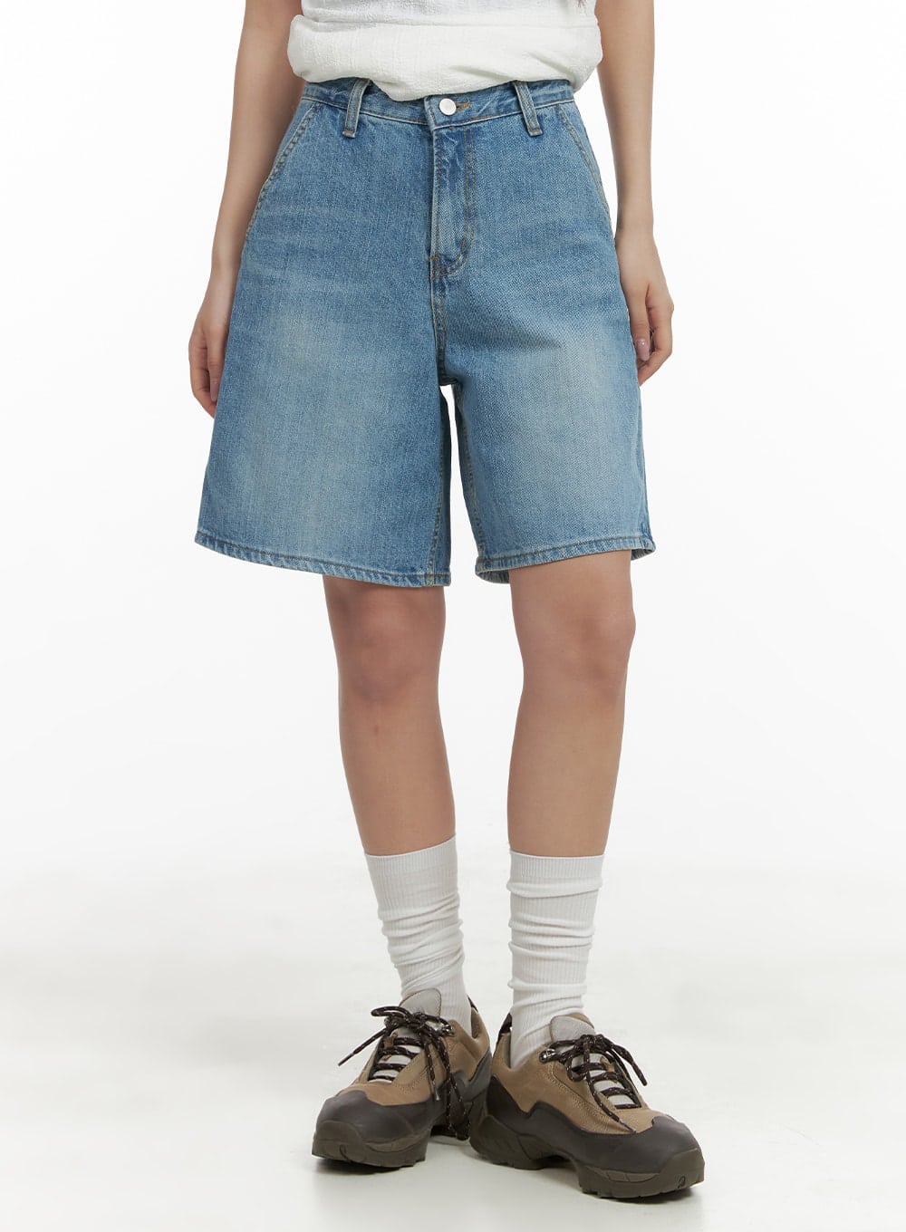 LEWKIN Washed Wide Leg Jorts CA409 in blue, front mid-shot on model, wide-fit washed cotton denim, knee-length hem, paired with white top and chunky hiking sneakers.
