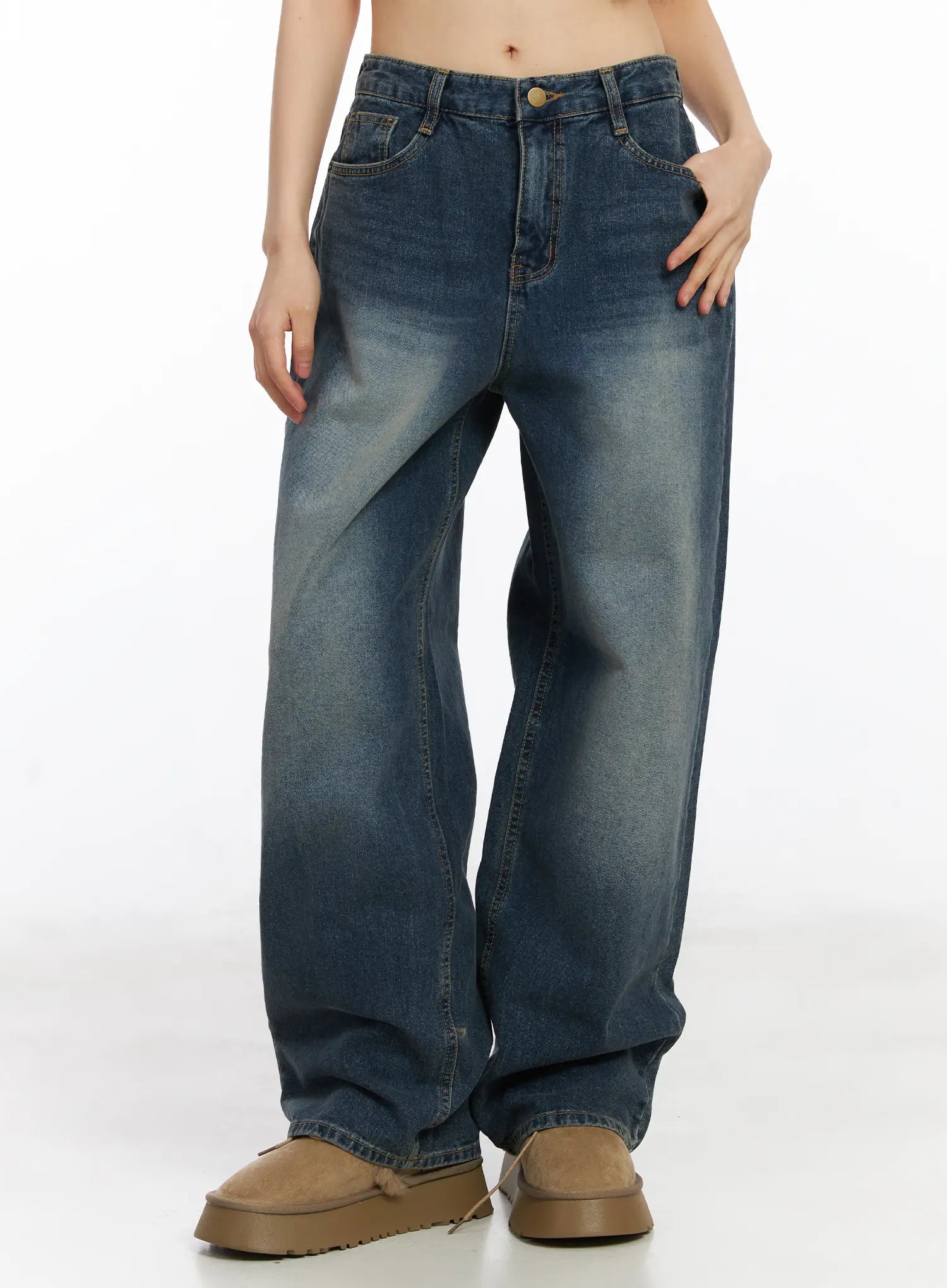 LEWKIN Eliza Fleece-Lined Washed Wide Leg Jeans CD518 in blue, front crop view on model, washed cotton wide-fit denim with subtle fading, paired with tan platform boots.