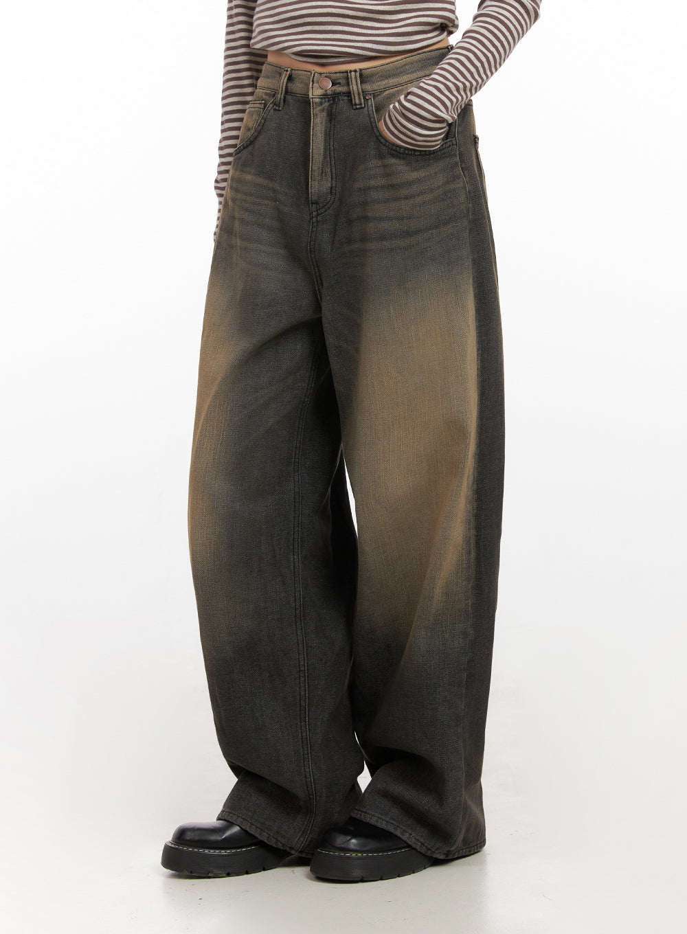 LEWKIN Alexa ComfyChic Washed Jeans CN428 in dark beige, front waist-down crop on model, wide-fit baggy cotton denim with warm brown-to-charcoal washed gradient, paired with striped top and black loafers.