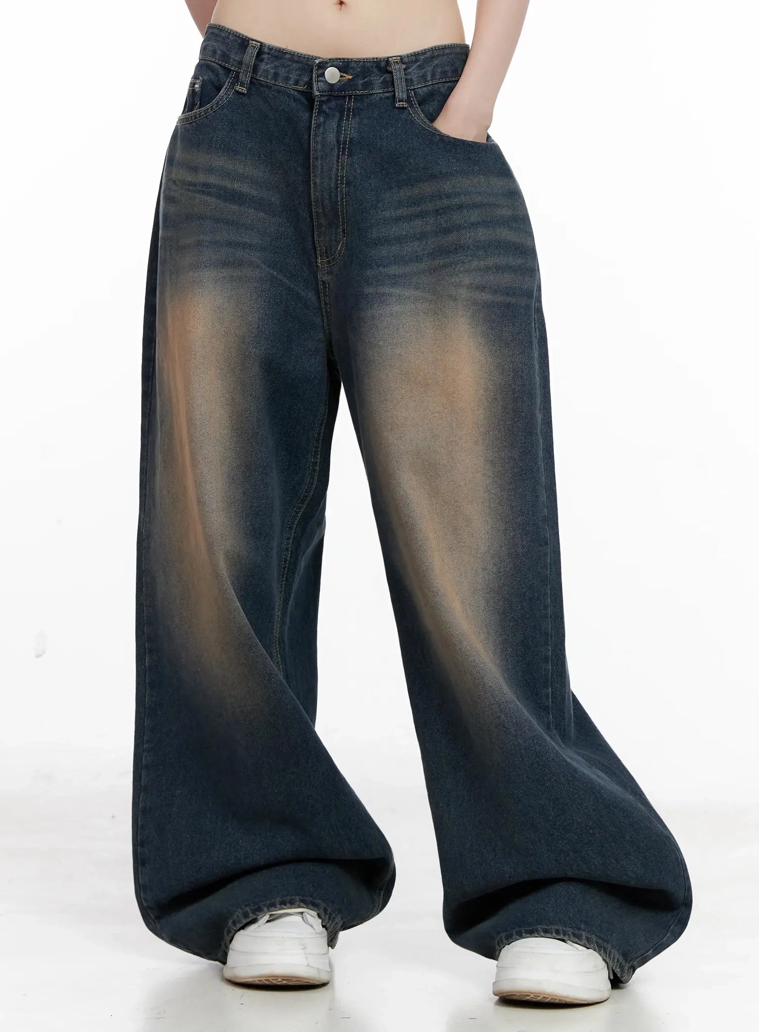 LEWKIN Solji Acid Washed Wide-Leg Jeans IL531 in dark blue, front cropped shot on model, wide-fit cotton denim with amber acid-wash fading, long length pooling at sneakers.