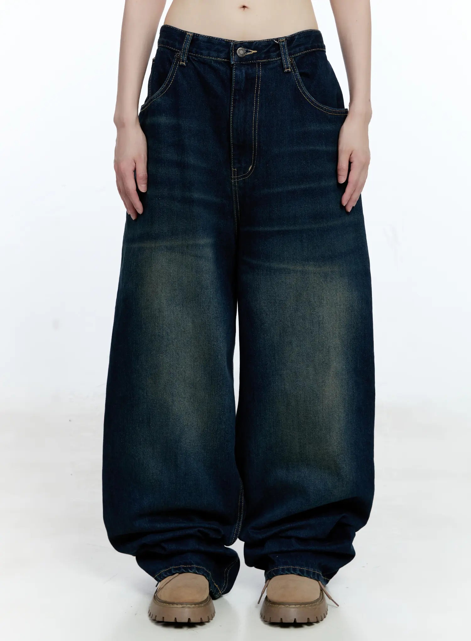 LEWKIN Jinnie Washed Wide-Leg Jeans CG511 in dark blue, front product shot on model, wide-fit cotton denim with washed fading, contrast stitching, front pockets, paired with beige chunky loafers.