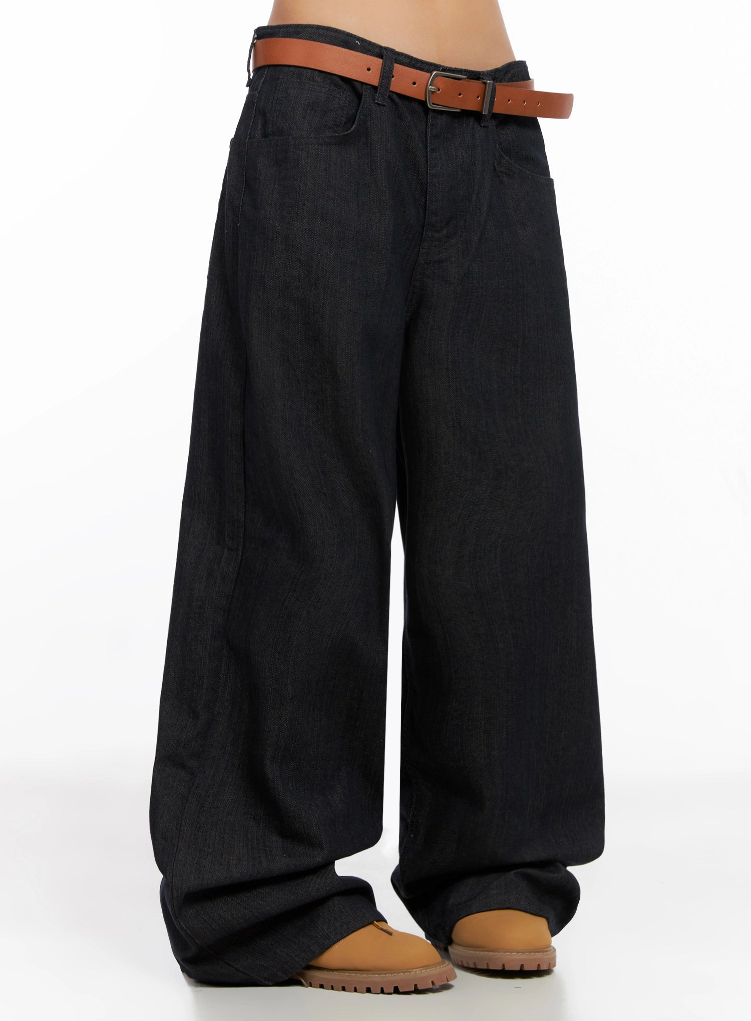 LEWKIN Heidi Wide-Leg Jeans IG527 in dark blue, side view on model, ultra-wide cotton denim with brown belt, floor-grazing length pooling over tan chunky shoes.