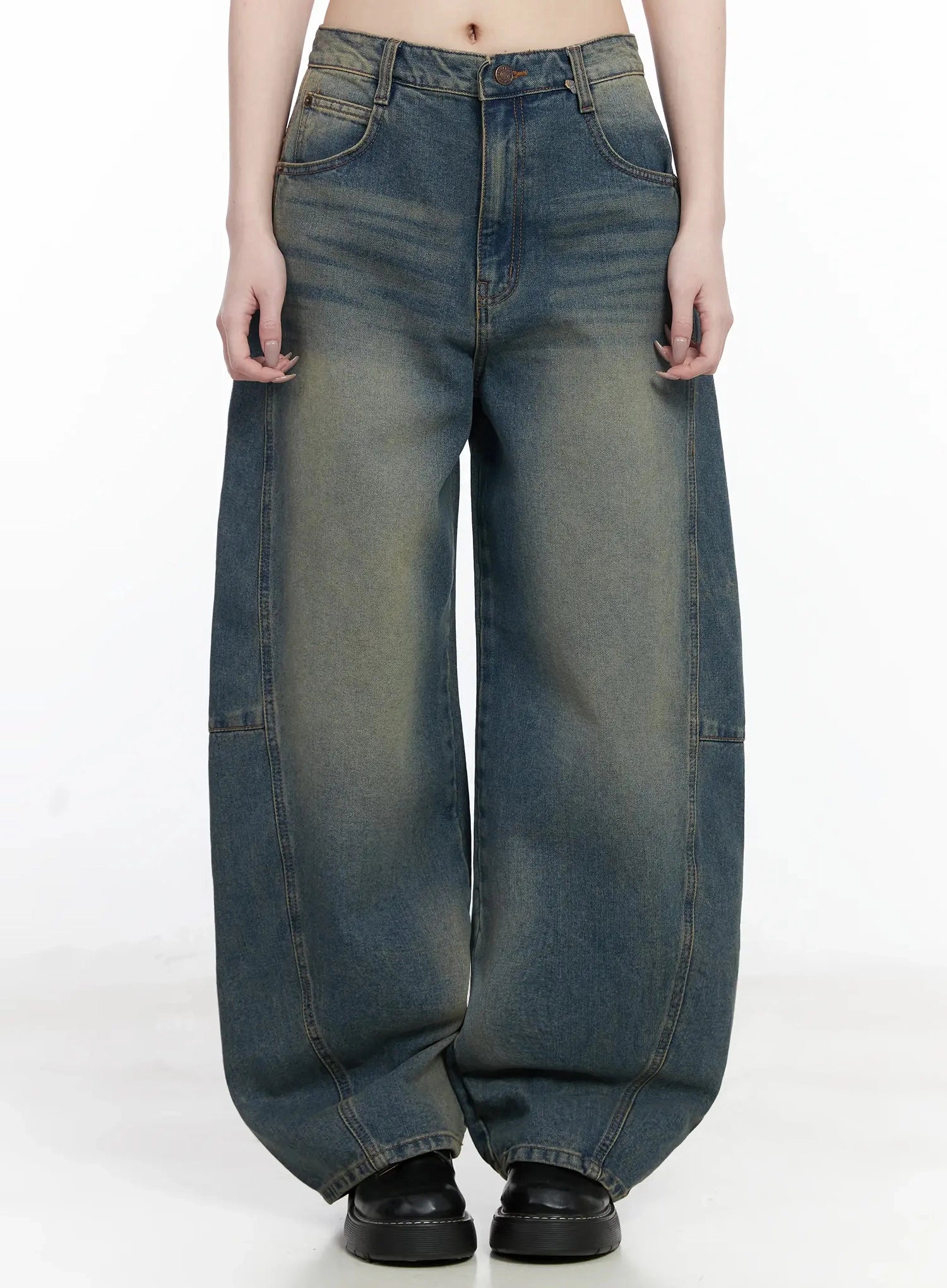 LEWKIN Tata Vintage Dark Blue Washed Wide Leg Jeans IJ528 in dark blue, front full-length product shot on model, balloon-shaped wide leg silhouette with vintage yellow-tinted wash, front pockets, paired with black loafers.