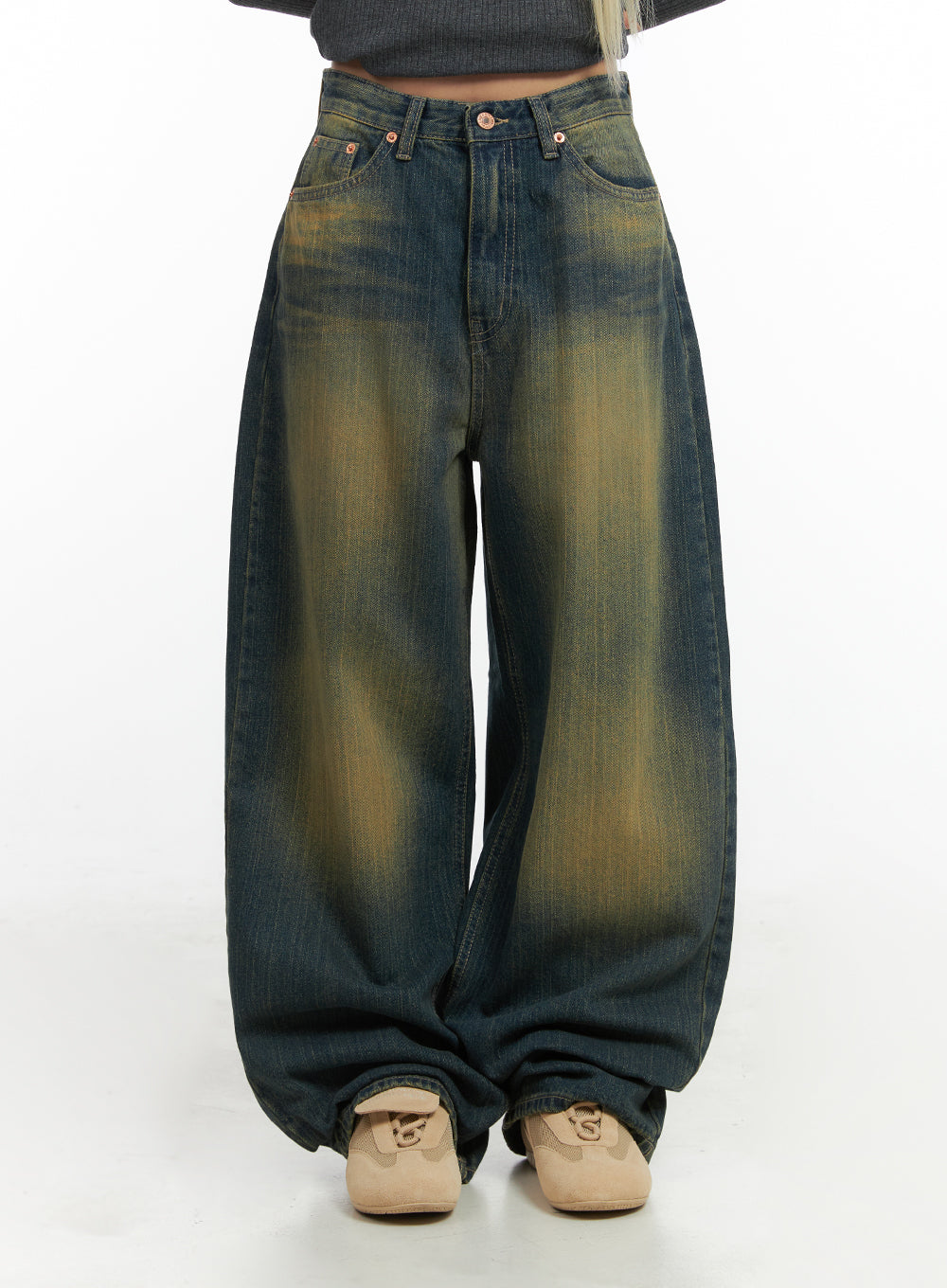 LEWKIN Georgia Vintage Wash Baggy Denim Jeans CO414 in dark blue, front crop shot on model, wide-fit cotton denim with yellow-toned vintage wash, pooling hem, paired with beige Mary Jane shoes.