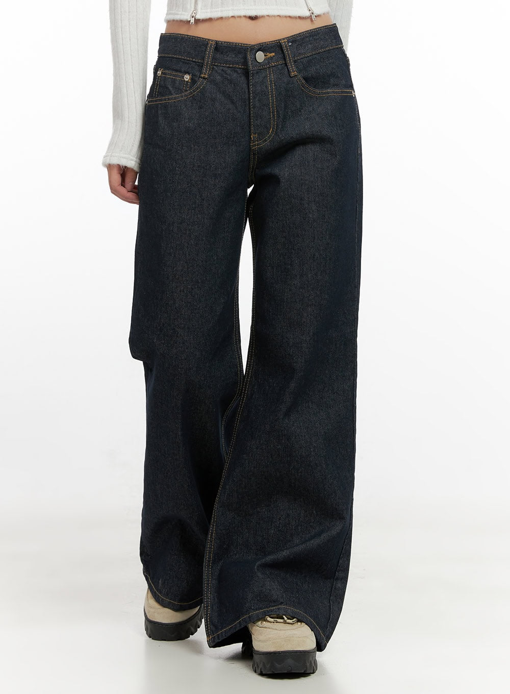 LEWKIN Lisa Cotton Comfort Wide Leg Jeans CN419 in dark blue, front close-up on model, low-rise wide-leg cotton denim with contrast gold stitch, paired with white crop top and chunky boots.