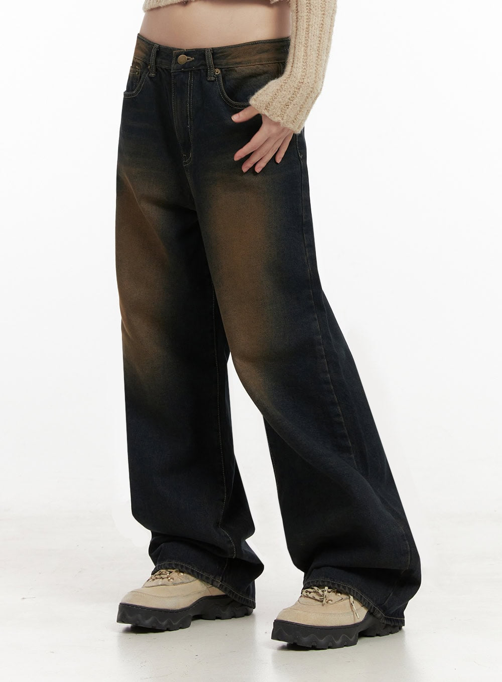 LEWKIN Alexia Washed Denim Wide-Leg Jeans ID402 in dark blue, side close-up on model, brown-toned washed cotton denim, wide leg silhouette, paired with beige knit crop and chunky boots.