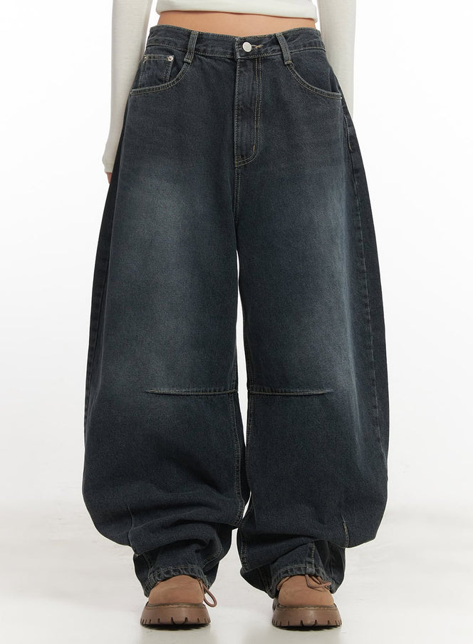 LEWKIN Giselle Stitched Balloon-Fit Jeans CF526 in dark blue, front crop shot on model, washed cotton denim with balloon silhouette and contrast stitching, paired with brown chunky boots.