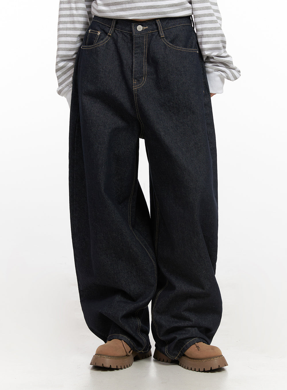 LEWKIN Lily Stitched Wide-Leg Jeans CN426 in dark blue, front crop shot on model, structured cotton denim with contrast stitching, wide balloon silhouette, paired with striped top and tan chunky boots.