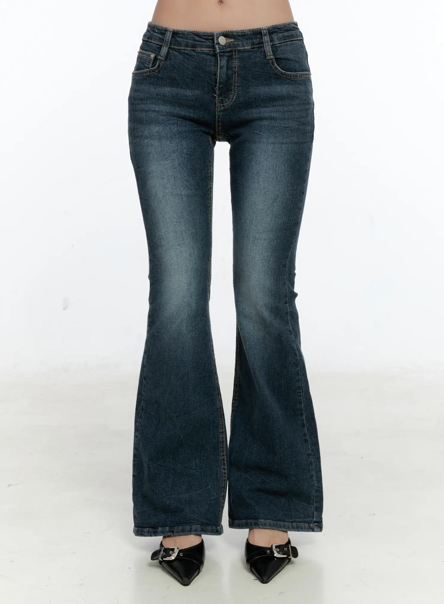 LEWKIN Harlee Bootcut Jeans CS517 in dark blue, front product shot on model from waist down, washed cotton-spandex denim with front pockets, button fly, and flared hem, styled with black buckle heels.