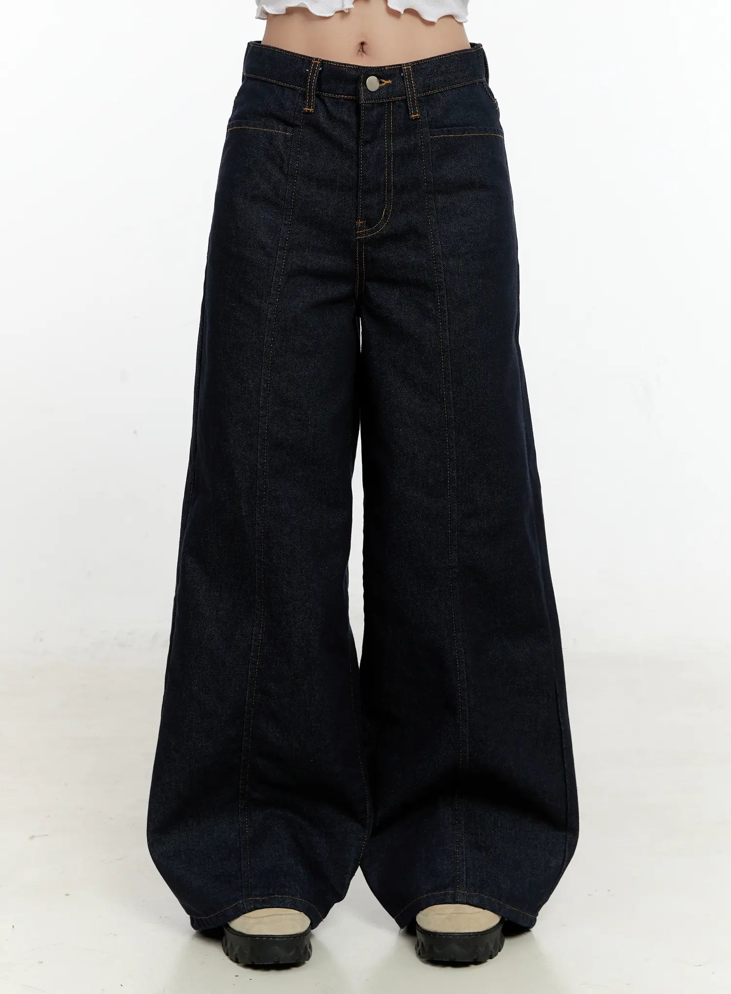 LEWKIN Nala Wide-Leg Bootcut Jeans CN506 in dark blue, front view cropped at waist on model, wide-leg silhouette with contrast gold topstitching and front patch pocket detail.