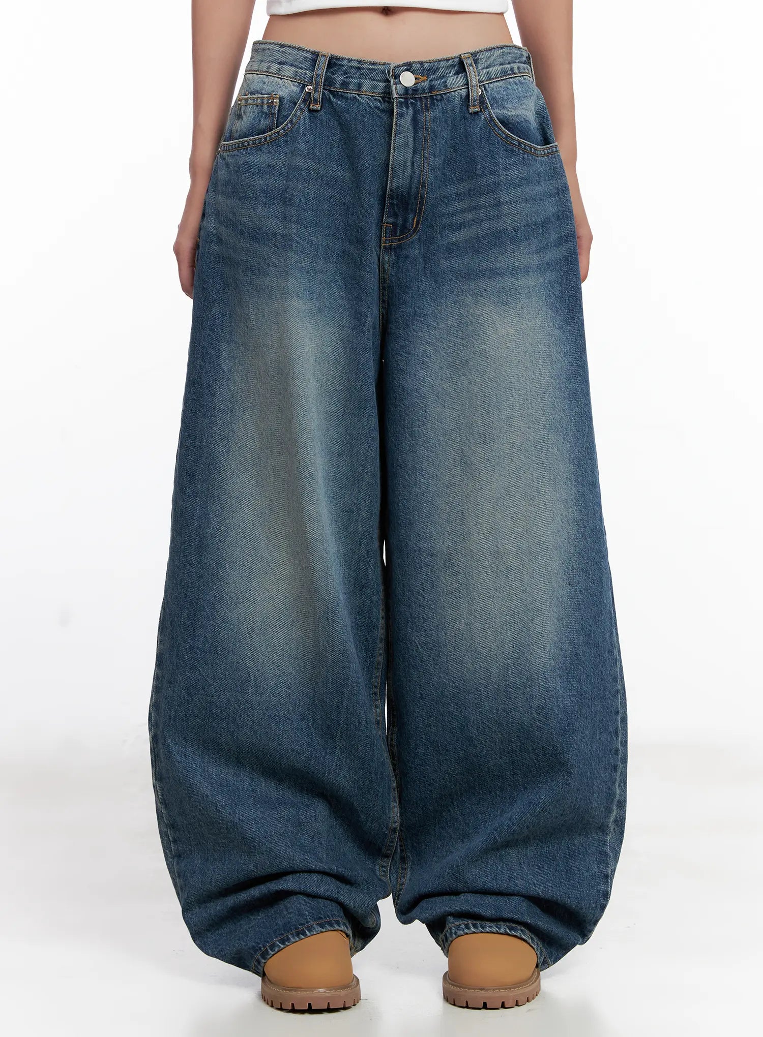 LEWKIN Miji Wide-Leg Washed Denim Jeans CL521 in dark blue, front waist-to-hem product shot on model, oversized balloon wide leg, washed cotton with faded finish, paired with tan chunky boots.
