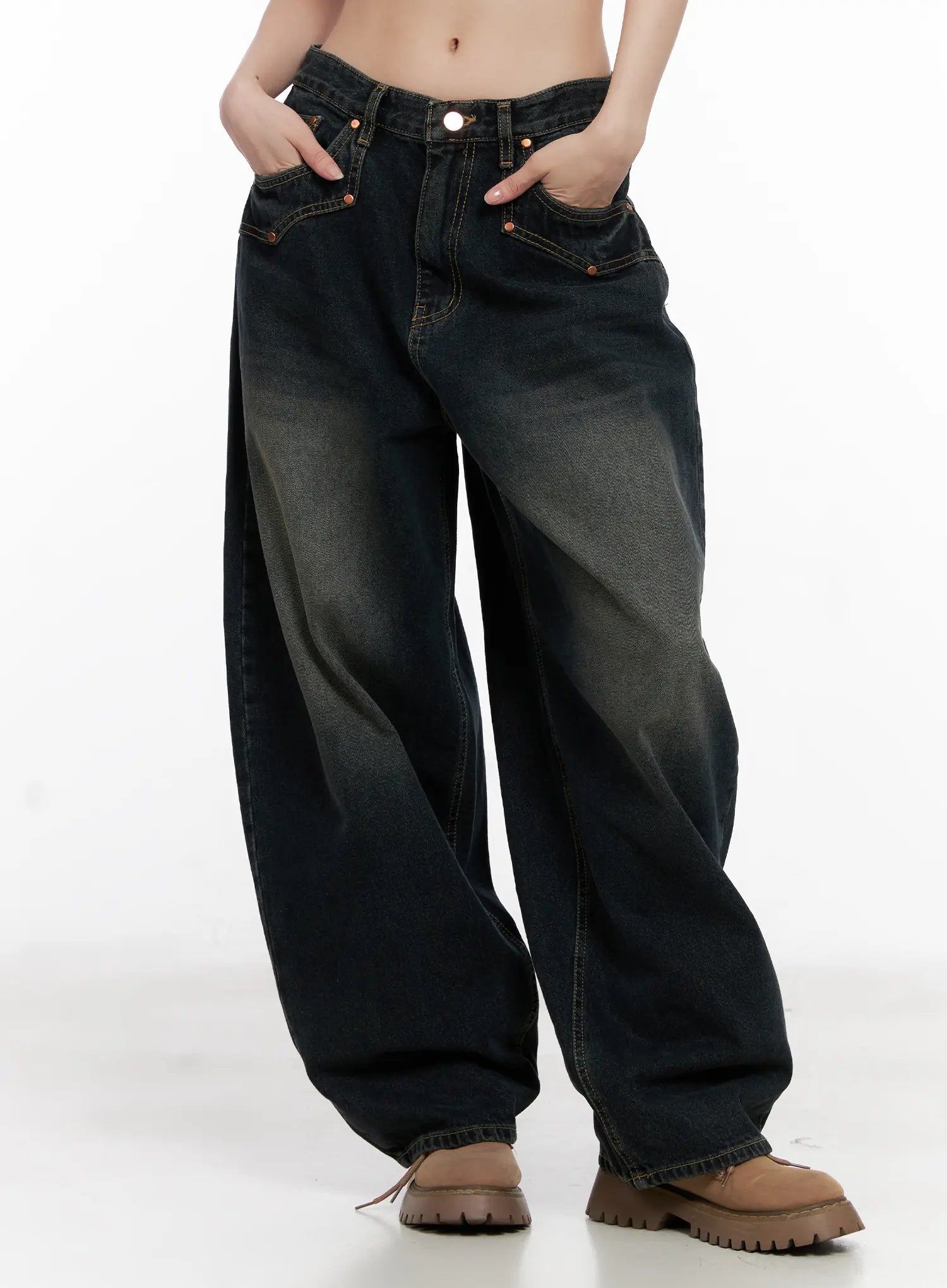 LEWKIN Hyer Washed Wide-Leg Jeans CG522 in dark blue, front crop view on model, low-rise wide-fit cotton denim with vintage wash fade, orange stitching, front pockets, paired with chunky boots.