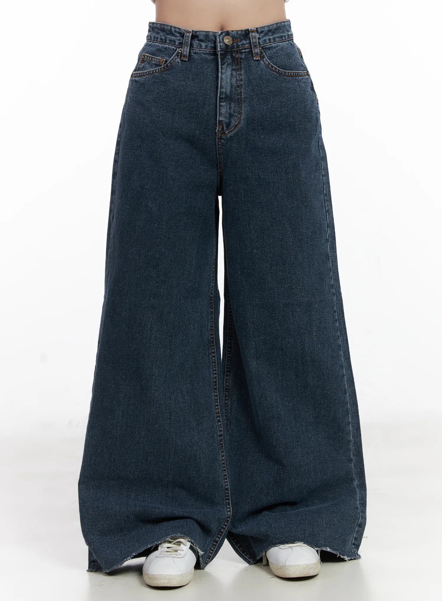 LEWKIN Louisa Ultra Wide Flared Jeans CN527 in dark blue, front product shot from waist down, ultra wide flared cotton denim with washed finish, five-pocket styling, raw hem, paired with white sneakers.
