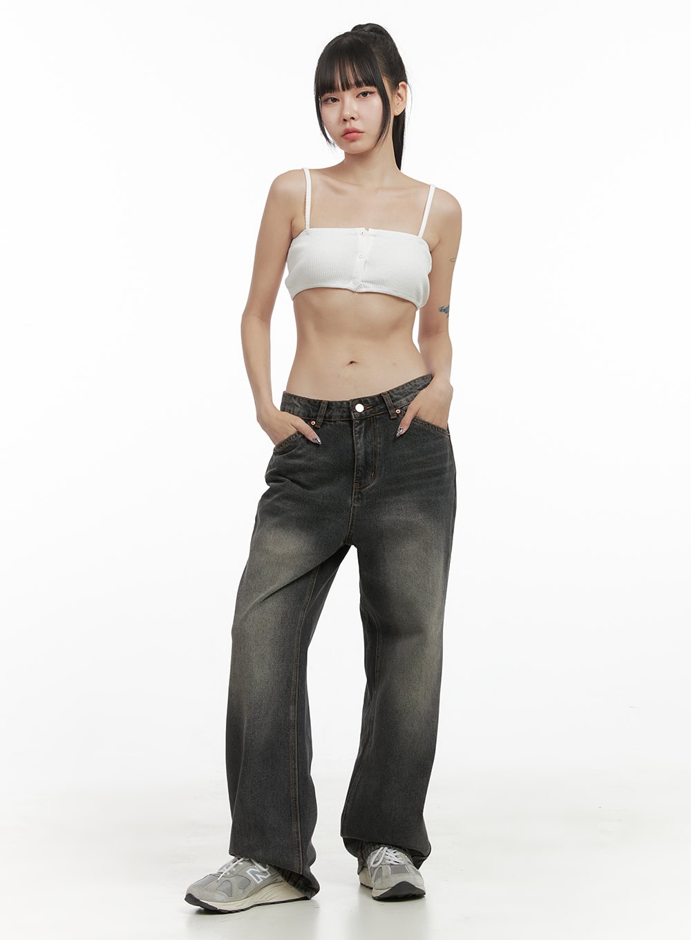 LEWKIN Mandy Washed Cotton Wide Leg Jeans OO401 in dark gray, full-length front view on model, wide-fit low-rise washed denim with faded finish, styled with white crop cami and sneakers.