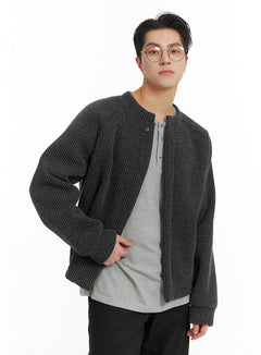 LEWKIN Men's Textured Knit Cardigan IA401 in dark gray, front three-quarter shot on model, ribbed open-front cardigan with button closure, layered over gray tee with black trousers.